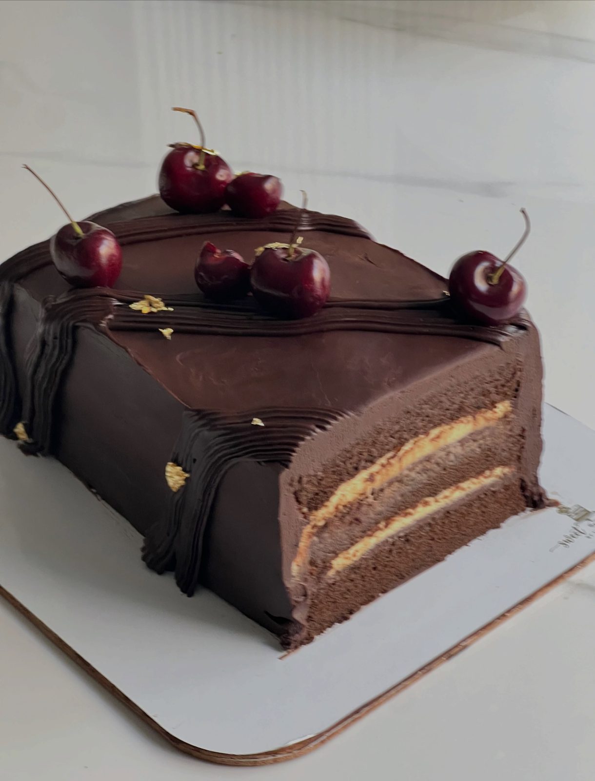 Chocolate cake sliced to show layers